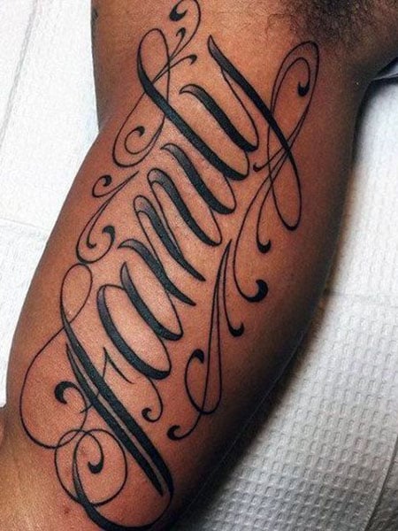 Have a little fun lettering tattoo on the upper arm