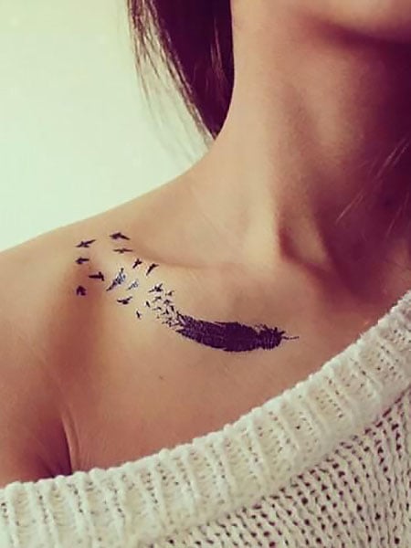 Feather tattoo on the chest