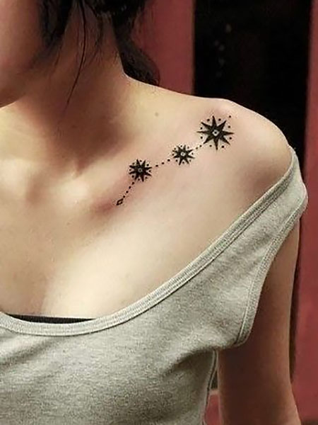 Minimalist north star tattoo on the chest