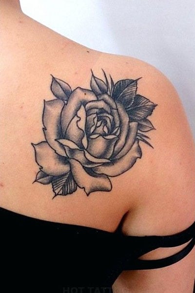 Fine line red rose tattoo on the upper back