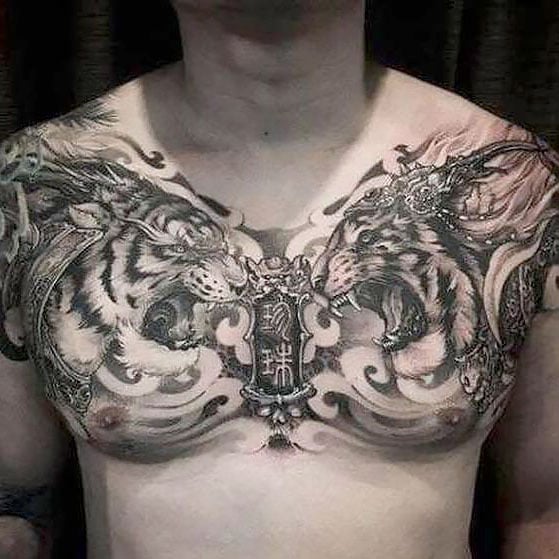 Black and grey chest piece by  Killer Ink Tattoo  Facebook