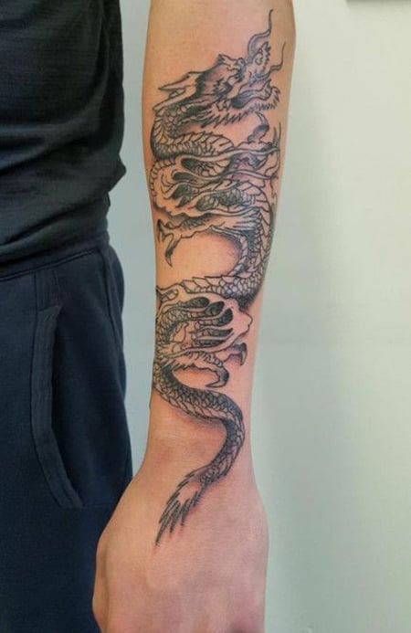 Edlitam  Dragon tattoo wrapping around Pradthanas arm  Facebook