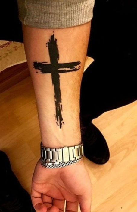 side wrist cross tattoo