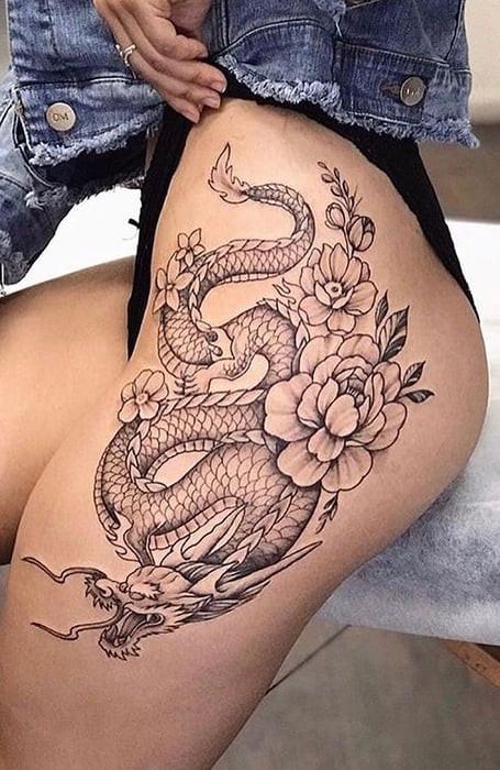 Cool Black Ink Wrap Around Dragon Tattoo On Right Leg
