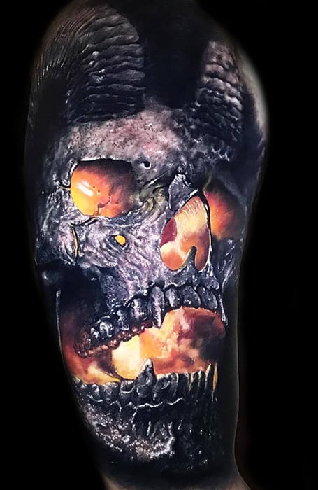 Black and grey realistic skull tattoo
