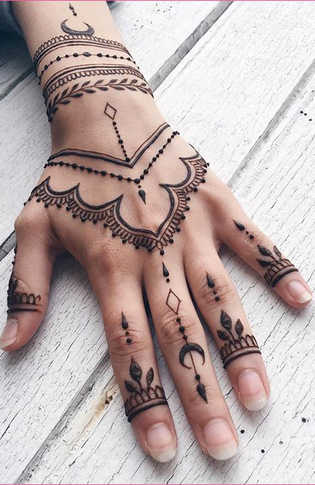 Beautiful black finger leaf tattoos by Tine Defiore  Hand and finger  tattoos Hand tattoos Full hand tattoo