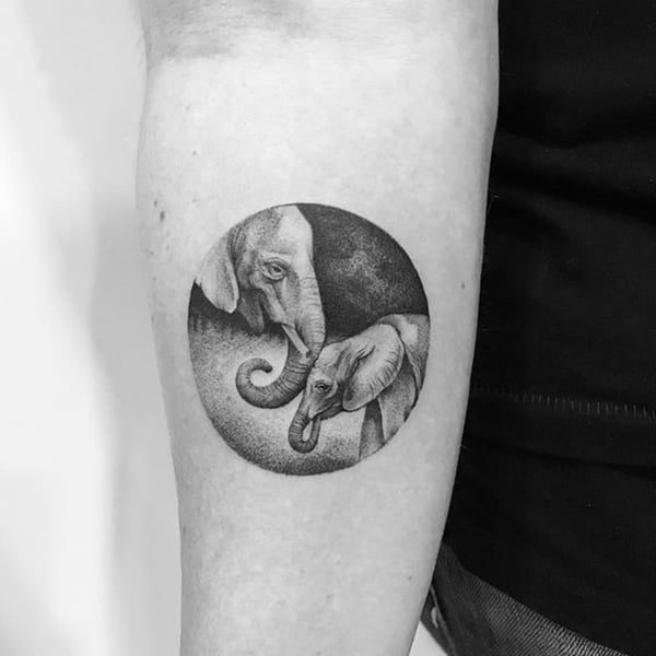 Minimalist elephant tattoo on the ankle