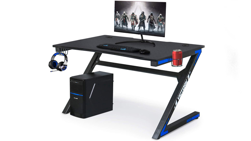 https://www.thetrendspotter.net/wp-content/uploads/2020/07/Computer-Gaming-Desk-with-Large-Carbon-Fiber-Surface-1.jpg