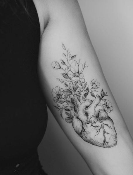 anatomical heart tattoo with flowers ideasTikTok Search