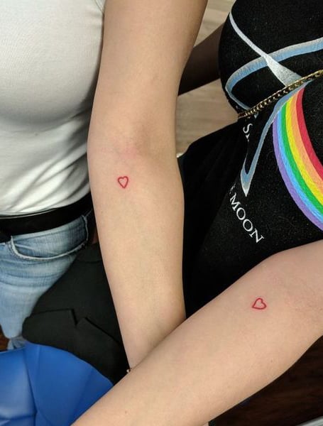 Tiny red heart  Red ink tattoos Red heart tattoos Red tattoos