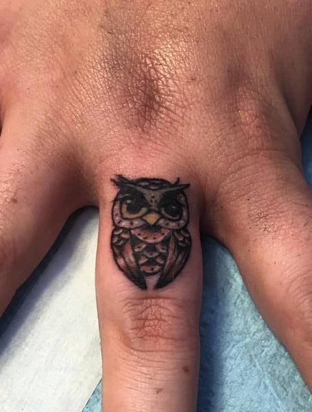 owl tattoos on forearm