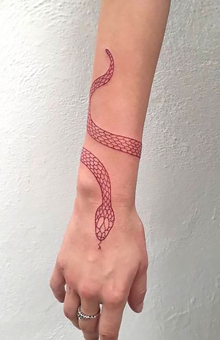Image result for snake wrist tattoo  Snake tattoo design Trendy tattoos  Snake bracelet tattoo