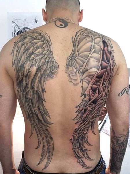 skeleton wings back tattoo