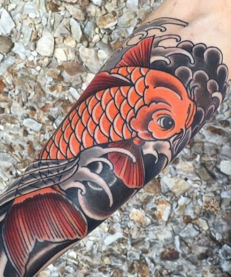 Engraving style koi fish tattoo on the forearm