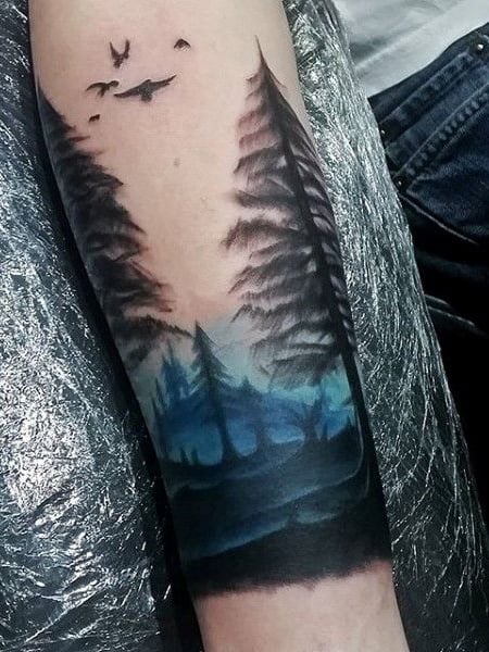 tree silhouette sleeve tattoo