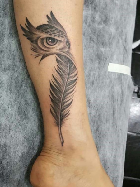 Indian Feather on Foot Tattoo Idea