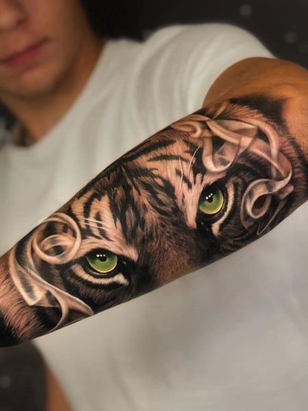 Tattoo uploaded by OLD LONDON ROAD TATTOOS  A roarsome blue eyed tiger  and rose thats got our jaws hanging open Done by the lovely simtattoos  Give us a call on 020