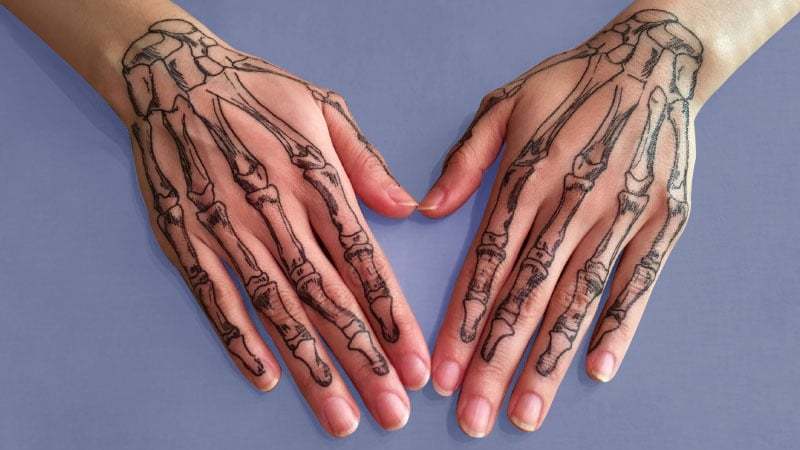 Skeleton hand tattoos the top skeleton hand tattoos of 2022  Very Good  Light