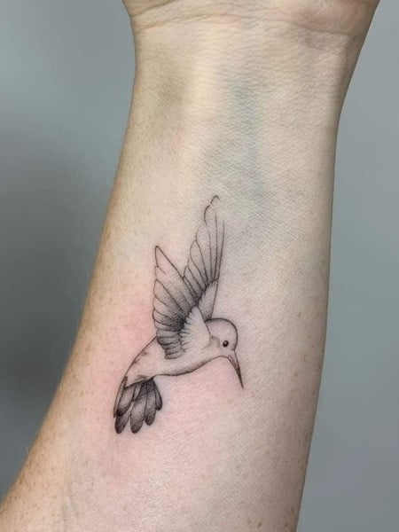 20 Stunning Hummingbird Tattoo Ideas  Bird tattoo wrist Small hummingbird  tattoo Feather tattoos