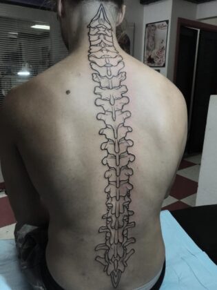 20 Incredible Spine Tattoos Ideas (2024) - The Trend Spotter