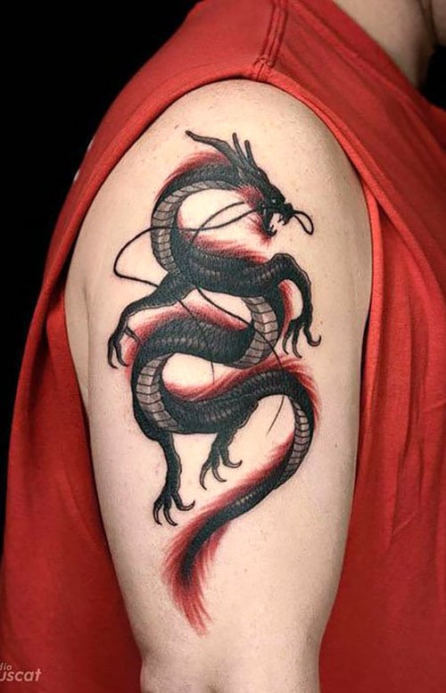 black and red tattoo on full arm  EntertainmentMesh