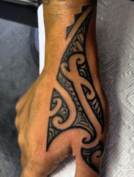 hand tattoos for men tribal