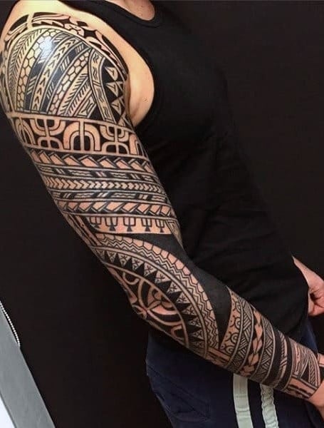 tribal tattoo along forearm - Arthub.ai