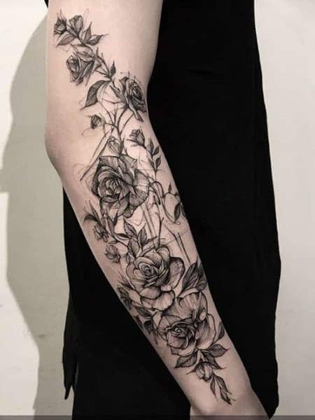 Tattoo of Vines Flowers Spine