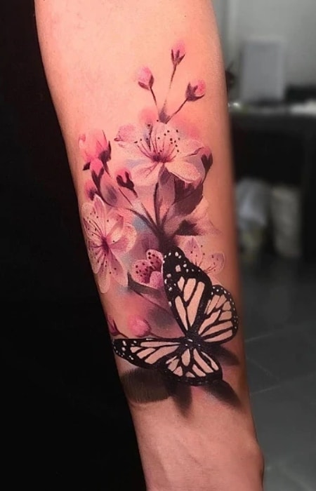 Butterfly and cherry blossom tattoo