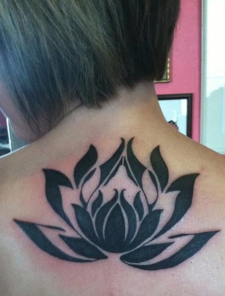 Lower Back Lotus tattoo women at theYoucom