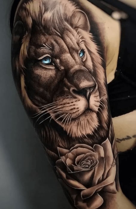 Realistic angry roaring lion tattoo design
