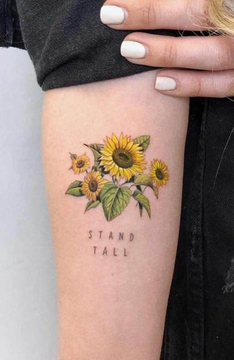 Tattoo uploaded by Stacie Mayer  A simple font offset by some pretty  sunflowers Tattoo by Leah Greenwood sunflower flower quote  newotraditional LeahGreenwood  Tattoodo