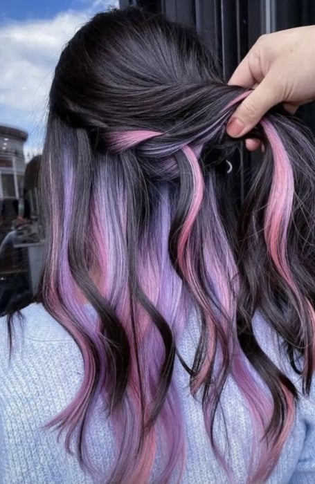 black hair with light pink highlights