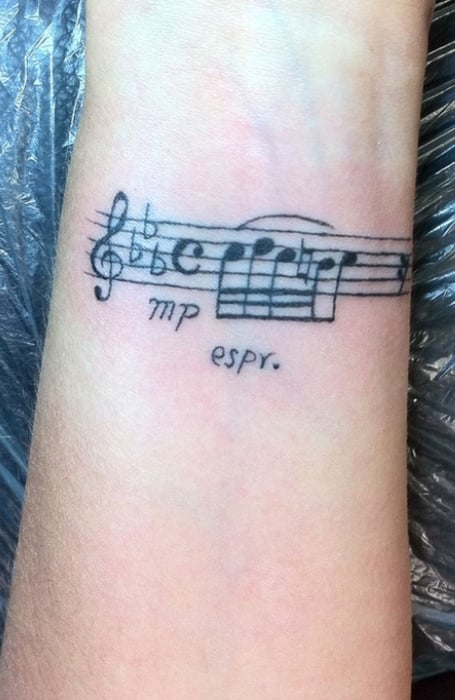 Music Tattoo Pictures: Music Notes, Instruments & Bands | Music tattoo  designs, Music notes tattoo, Music tattoos