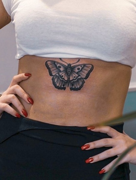 Do Underboob Tattoos Hurt What to Know About Sternum Tattoo Designs