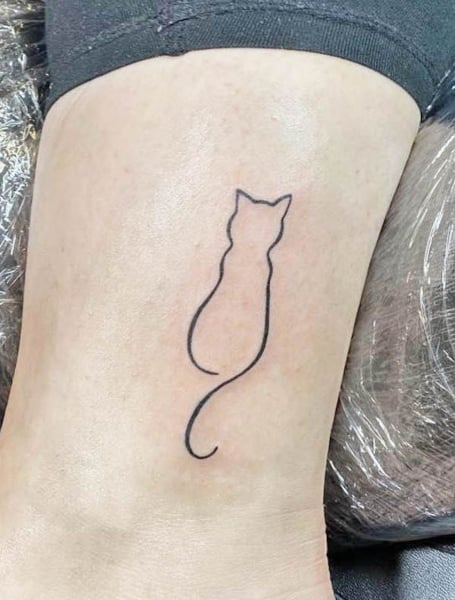 cute cat outline tattoo