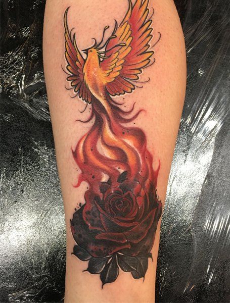 Phoenix rising from fiery lotus flower tattoo courtesy of studio 13 Cocoa  Beach  Tattoos Flower tattoo Lotus flower tattoo