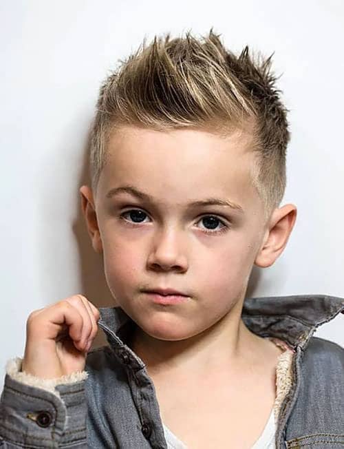 Image of Indian little boy posing with a funky hairstyle-MY795766-Picxy