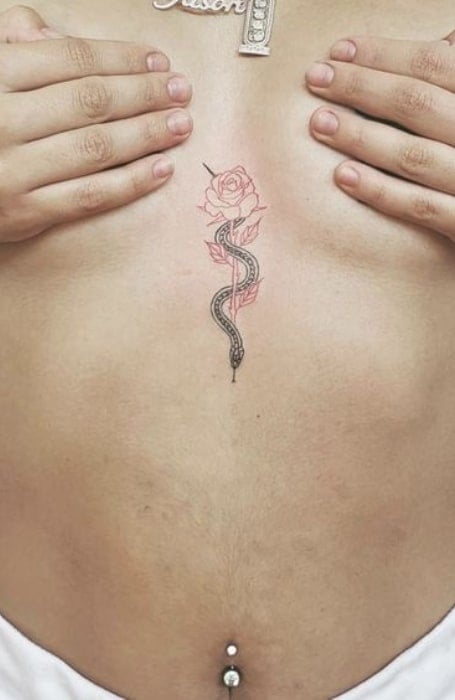 Rock of Ages Tattoo Parlour Lennox Head AUS  Small sternum snake tattooed  by nawojkatattoo For booking enquiries email  nawojkayahoode   Facebook